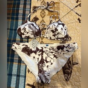 Roidal brand bikini swimsuit featuring a brown and white floral print NWT